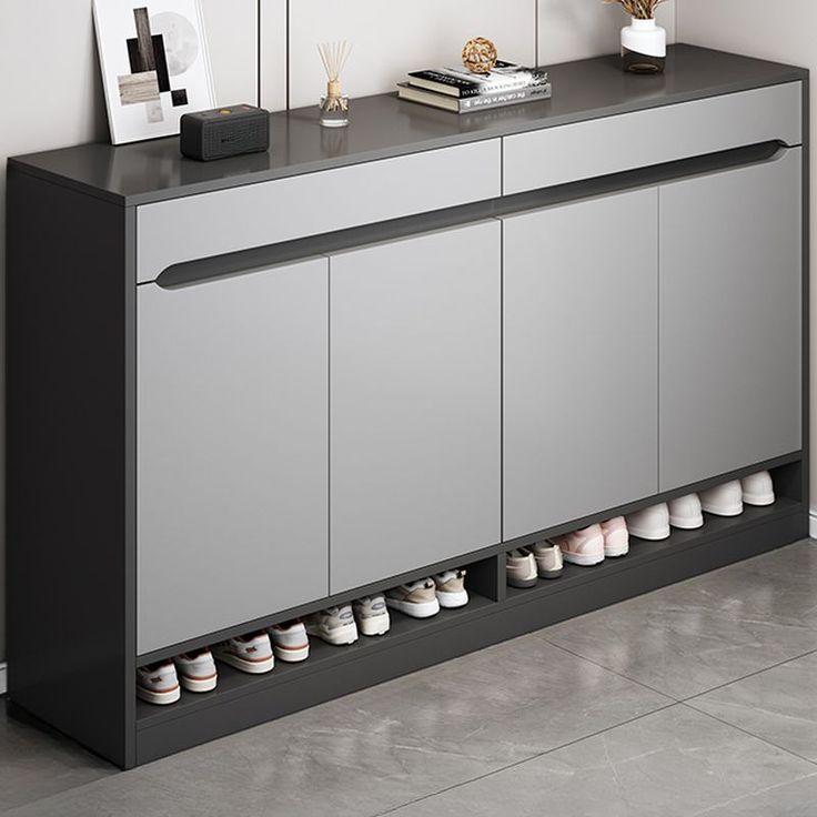Modern gray and black shoe cabinet with four doors and open shelf